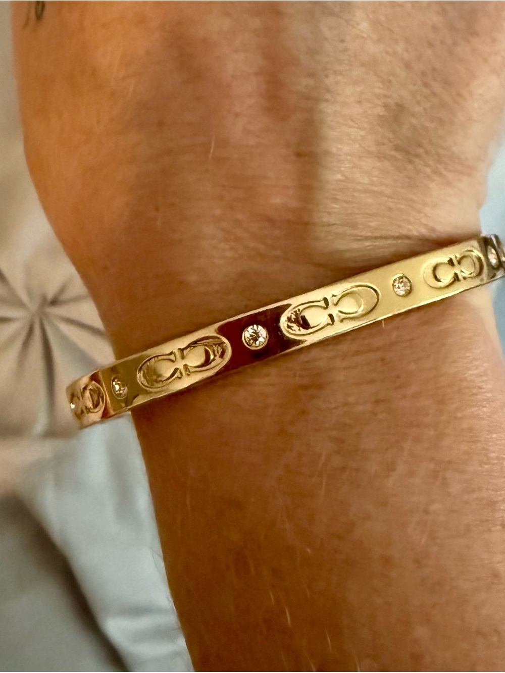 Coach Kissing C Signature Gold Hinged Bangle Crystal Bracelet